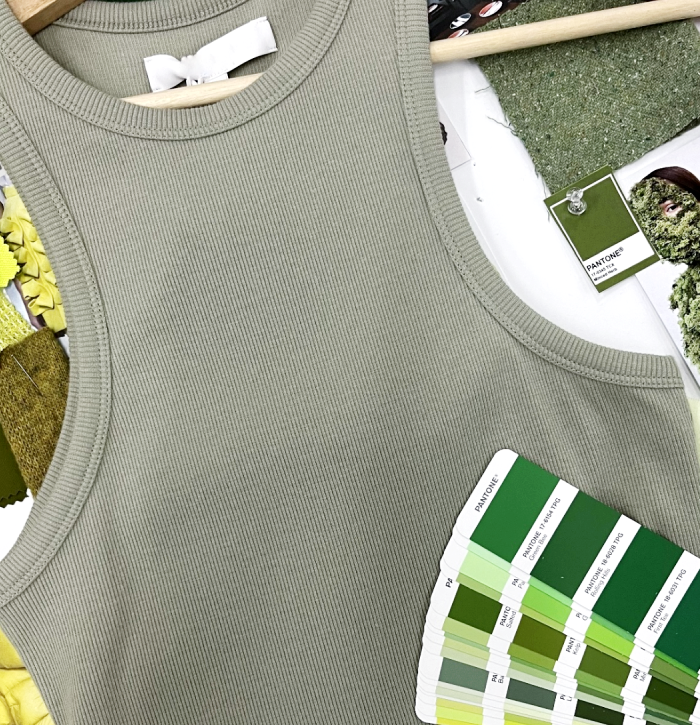 A photo of a sustainable green tank top.