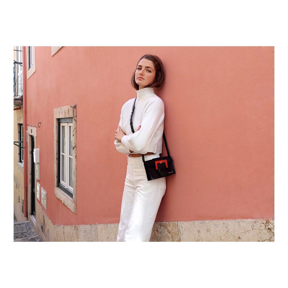 girl with colorful handbag