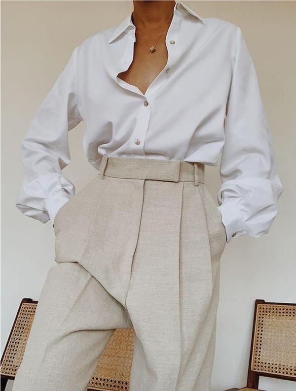Ideas To Dress In Wide-Leg Trousers for the summer. Beige trousers with a white Oxford shirt.