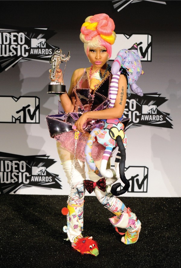 Best Runway Moments. Nicki Minaj in a full metallic corset bodysuit and a pink wig.