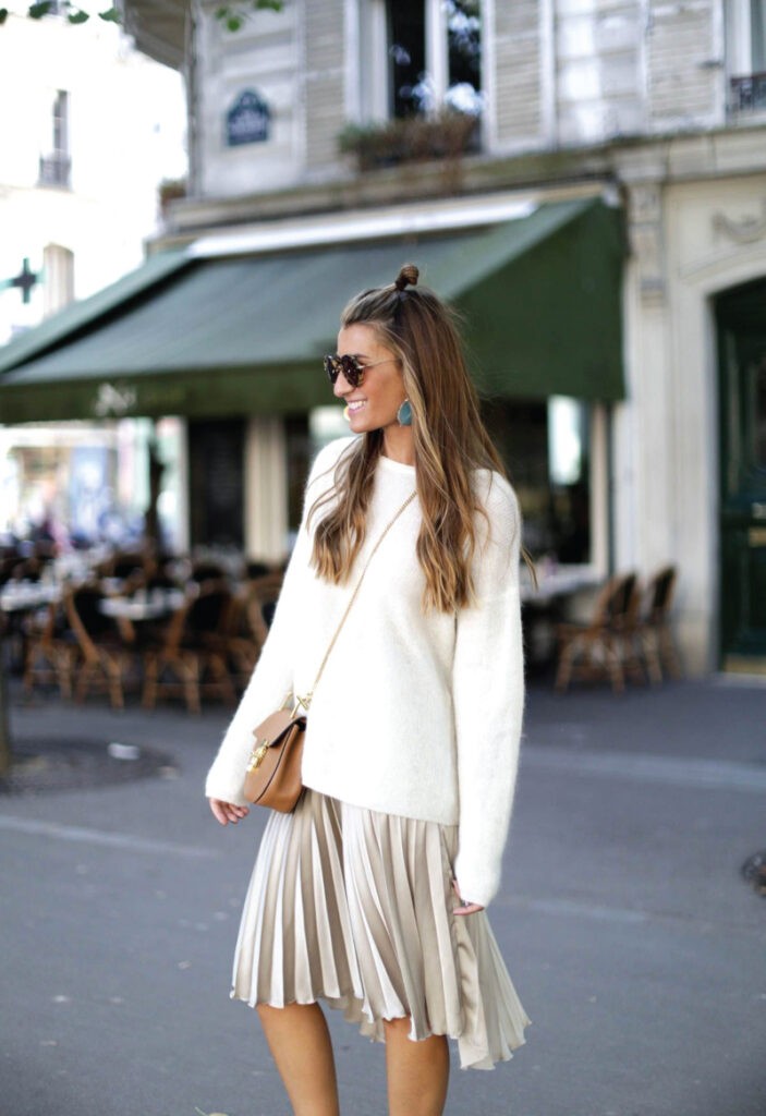 Fall Skirt Trends You Will Want To Wear Everyday: beige pleated midi skirt.