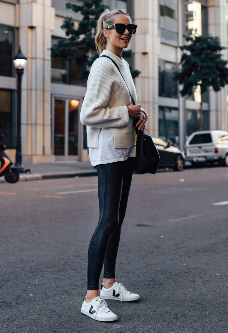 The Fall Trends You Will Want To Show Off On Instagram. A casual look with black leggings and a neutral sweater and cool sneakers.