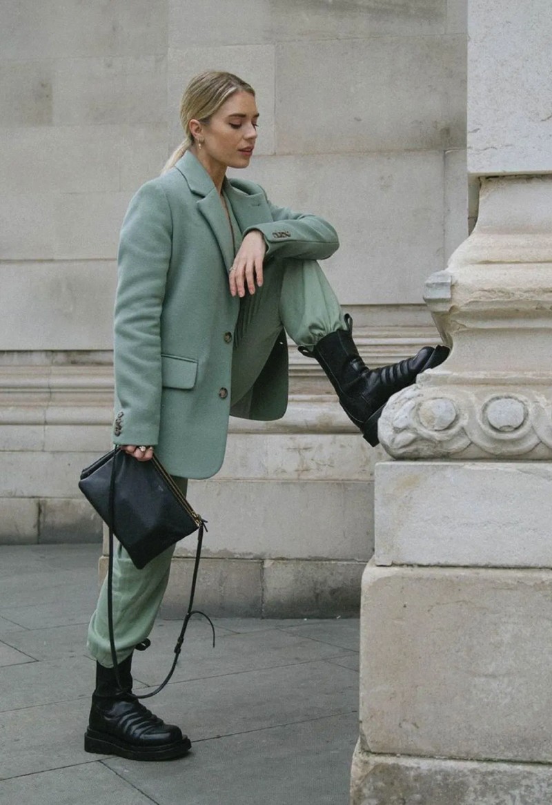 The Fall Trends You Will Want To Show Off On Instagram. A green oversized suit with cool black army boots.