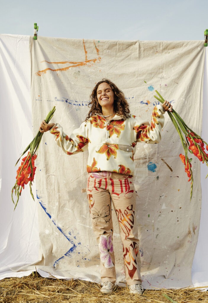 Juliet Johnstone The Artist Behind Hand Painted Outfits. Juliet wearing her custom fleece and pants.