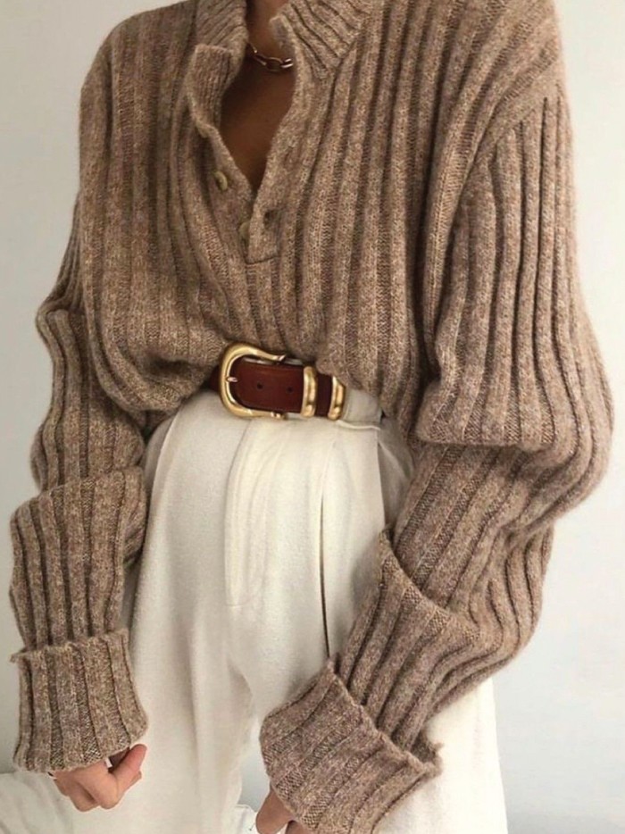 Knitwear Trends To Keep Cozy This Winter. Neutral beige jumper.
