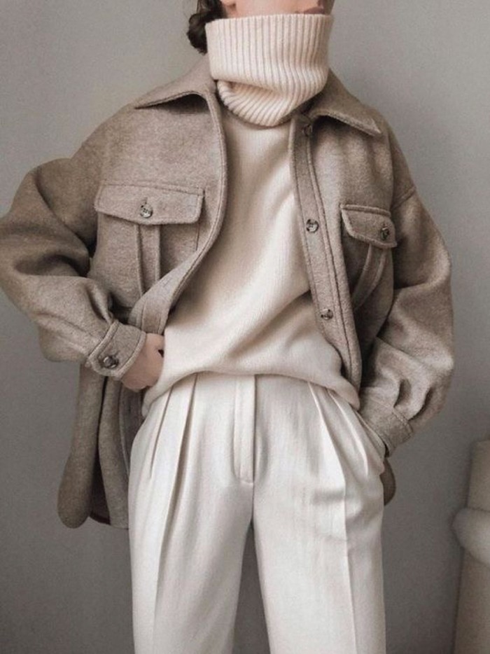 Knitwear Trends To Keep Cozy This Winter. Neutral beige jumper.