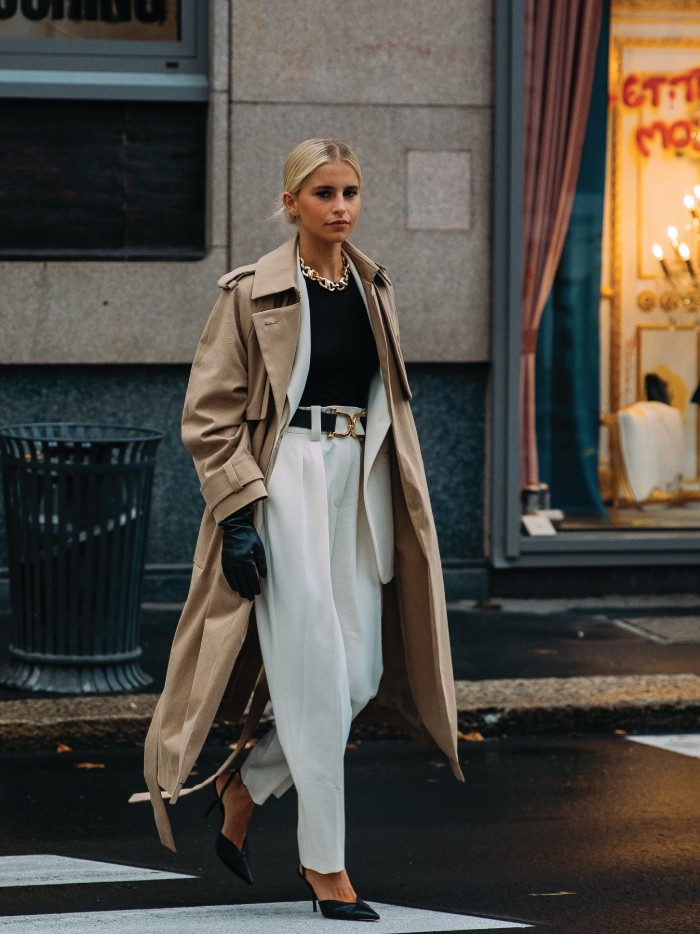 The 2021 Fashion Trends You Need To Watch Out For. Androgynous tailoring: white suit and a big beige coat.