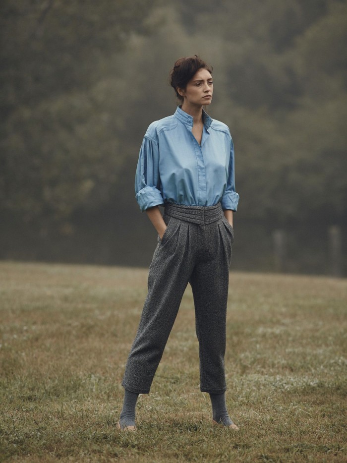 The 2021 Fashion Trends You Need To Watch Out For. Androgynous tailoring: loose trousers and a blue satin shirt.