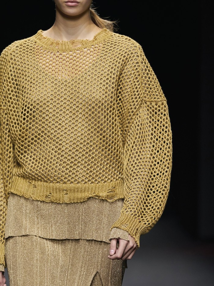 The 2021 Fashion Trends You Need To Watch Out For. Revived crochet: crochet yellow sweater.