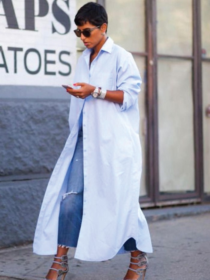 Dress Trends That French Women Are Bringing Back. Button-up dress in baby blue.