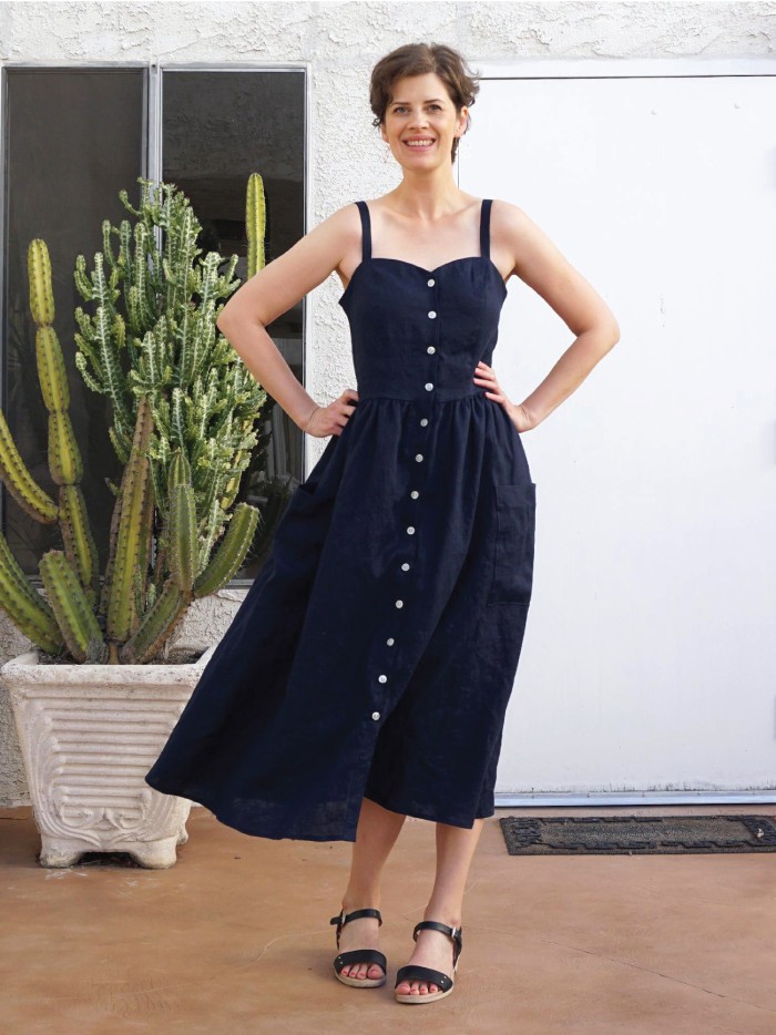 Dress Trends That French Women Are Bringing Back. Button-up dress in blue.
