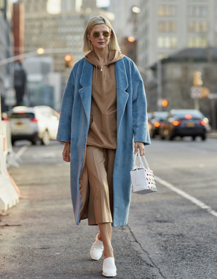 The Best Jeans Alternatives For When You Are Tired Of Wearing Denim. Beige co-ord set with blue jacket on top.