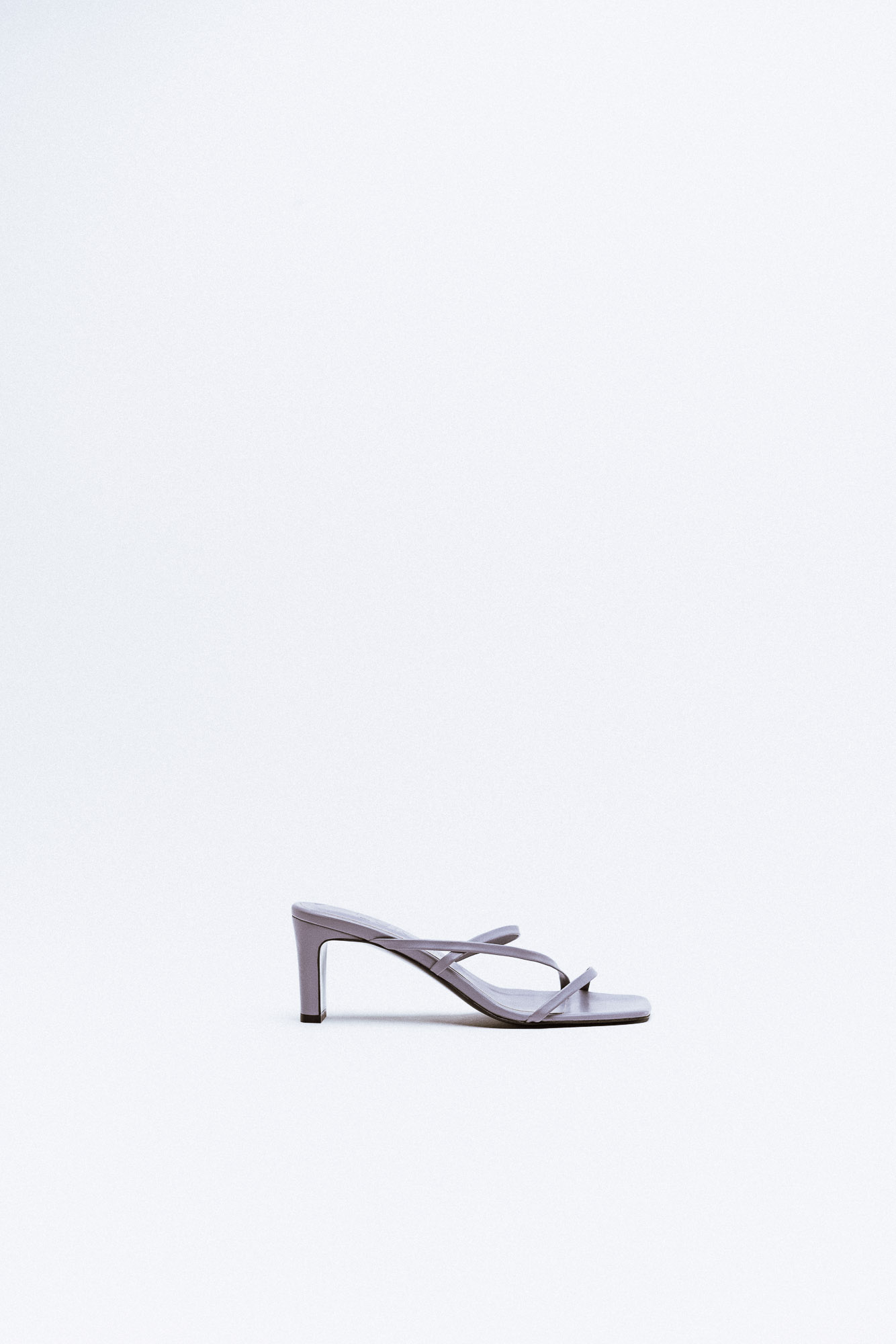 Light lavender toe sandal with low heel, product specifications.