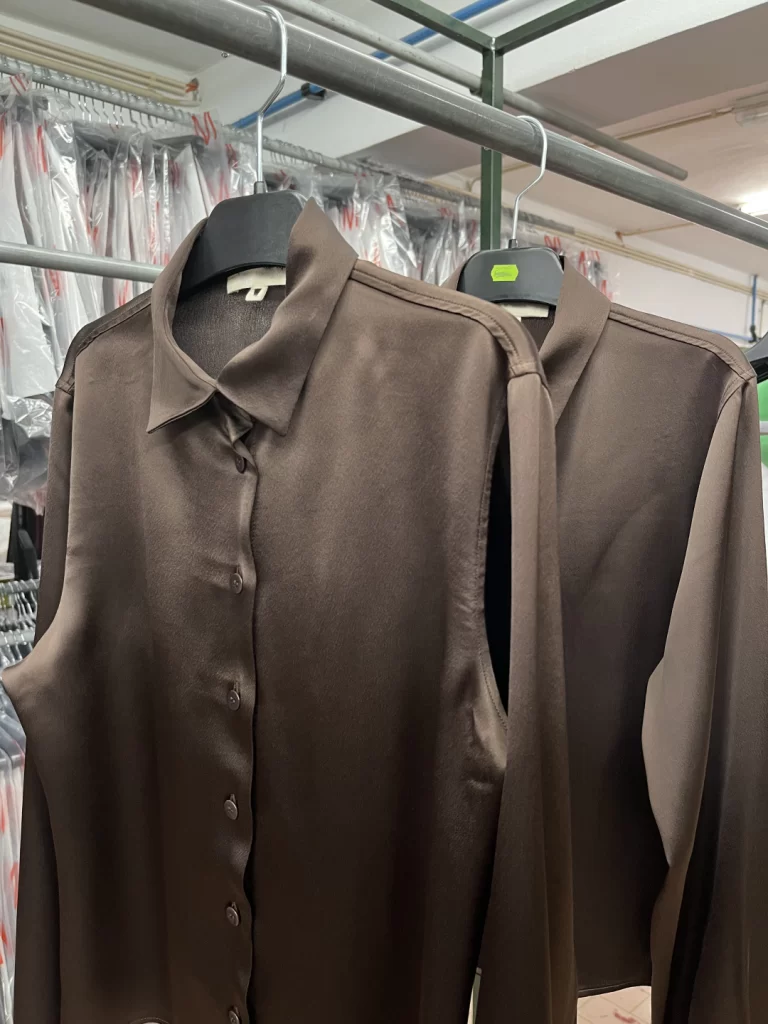 High-end finished garments ready for delivery in Portugal