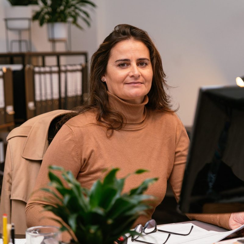 Chief Financial Officer working at the computer.